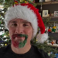 Shane let me do the glitter beard for him. #merrychristmas #glitterbeard  #festive2024_nio #redandgreenweek_hp #359_getting_ready_24  #hiyapapayaphotoaday #christmas