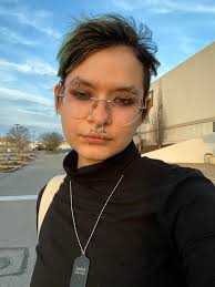 What songs should be included in a Monster High themed 2010s pop playlist?