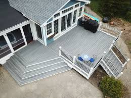 Composite decking is typically made from a combination of different materials (namely, wood and plastic), which are. Corner View Of Trex Island Mist Composite Deck Regan Total Construction