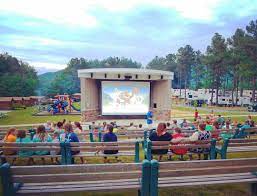 Enjoying The Yogi Bear Movie At The Outdoor Theater Yogi Bear S Jellystone Park In Luray Va Jellystone Park Outdoor Movie Theater Outdoor Theater