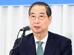 Han Duck-soo confident about candidacy merger with PPP as 'will of the  people'