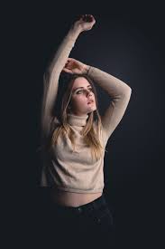 Moody Studio Portrait Of Woman With One Light And A Black V Flat Background Studio Photography Poses Studio Photoshoot Ideas Studio Photoshoot Ideas For Women