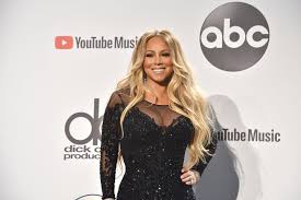 Mariah Carey Tells Fans Fire Music Is Coming With New Album Caution |  GRAMMY.com