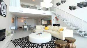 A discreet ceiling lighting creates a natural uniform. Beautiful Duplex Home Interior Design Ideas