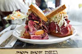 The popular sandwich orders appear to be the slam dunk, which consists of thinly sliced italian beef that's dunked in homemade gravy and topped with provolone, and the mvp signature (pictured)—with homemade pastrami and italian white cheddar cheese sauce and garnished with relish. Best Pastrami In Nyc Sandwiches To Make Your Mouth Water Thrillist