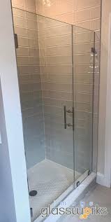 very clean door and panel with 3 8 thick standard clear glass polished chrome hardware and a 6 ladder p frameless shower doors shower doors frameless shower