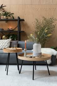 This coffee table has a lower shelf that's also made from tempered glass. Oak Tray Coffee Or Side Table Zuiver