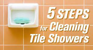How To Clean Tile Showers And Grout The Maids Cleaning Shower Tiles Shower Tile Clean Tile