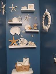 All you need to do is to use some accents that are naturally maritime or beachy. Tap For That 40 Off Or More Sale For Home Decor Items At The Incredible Shire Fire And Beach Theme Bathroom Beach Bathroom Decor Mermaid Bathroom Decor