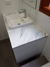 You can trim the countertop to fit. Wilsonart Calcutta Marble Laminate Textured Gloss Finish On Bathroom Vanity Calcutta Marble Bathroom Laminate Countertops Bathroom Bathroom Countertops