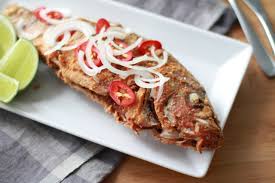 This dominican fried red snapper is the best fish i have ever had in my entire life. Andrew Zimmern Cooks Fried Whole Yellowtail Snapper
