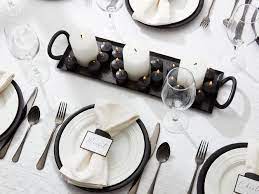 These black and white decorations with floating water beads and a floating candle look so elegant and are so easy to recreate. Black And White Party Attire And Hosting Tips