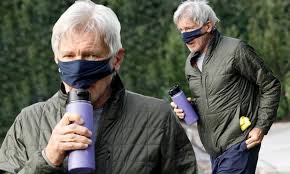 And that's before they put on their latex betty masks. Harrison Ford Lifts His Mask To Sip Some Water Before An Early Morning Tennis Match In Brentwood Daily Mail Online