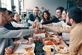 When the party takes place at a friend's house in winter, make sure that your outerwear can take it that the host/ess throws every coat. Cheers To Friends Group Of Young People In Casual Wear Stock Photo Crushpixel