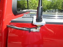 I have two, one on each side. Tonneau Cover Mobile Ham Radio Antenna Fiberglass Rv