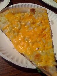 Stretch and roll pizza dough into a large round, about 12 wide. Mac And Cheese Pizza
