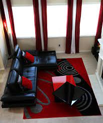 A red sofa is ideal for a contemporary living room, and the look works best when you mix it with neutrals. Red And Black Living Room Ideas Photos Houzz