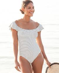 Black And White Striped One Piece Bathing Suit A Sporty One Piece With Slim And Slimming Stripes That Change Direction And The Option To Remove The Halter Stra One Piece Striped One Piece Women Swimsuits