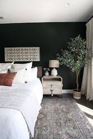 Dark Green Guest Room With Boho Style The Diy Playbook Bedroom Green Guest Bedroom Green Rooms