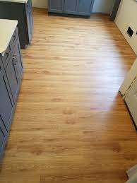 Beautiful Coretec Luxury Vinyl Tile Color Peruvian Walnut This Rockville Maryland Kitchen Vinyl Plank Flooring Kitchen Vinyl Flooring Prices Vinyl Flooring