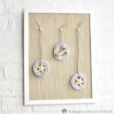 What kind of decor does a tropical home have? Diy Beach Themed Decor Idea Sea Shell Wall Art
