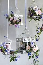 Bird Cage Decor Ideas For Weddings An Industrial Style Kitchen In Romantic Paris You Ll Love Diy Wedding Decorations Wedding Birdcage Bird Cage Decor