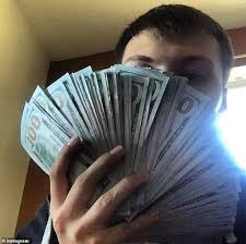 A banded stack of u.s. Man 20 Is Charged For Running Illegal Vaping Empire With His Brother From Rented Wisconsin Condo Daily Mail Online