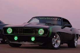 Here are 5 mods for camaro's that you should seriously consider as the first mods you install! 1969 Black Camaro With Green Halo Lights Interesting Camaro Chevy Camaro Hot Rods Cars Muscle