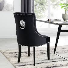 Find modern dining chairs as dashing as the table itself. Lion Black Velvet Knocker Back Studded Dining Chair Colour Black
