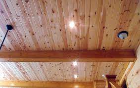 This allowed the color of the ceiling to be reflected in the bedding and in the commissioned art. Knotty Pine Wood Paneling Interior Pine Wood Paneling Home Knotty Pine Paneling Pine Paneling Wood Paneling