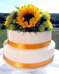 Place the mini oreos on the center of the cupcakes and pipe the yellow buttercream in a sunflower design. Sunflower Wedding Cakes Lovetoknow