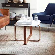 We have been eyeing this for a while and have a toddler. West Elm Leigh Coffee Table