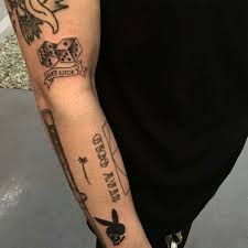 You can get a tattoo of that date in roman numbers. Arm All Random Tattooed Scattered About But Looks Good And Simple Clean Arm Tattoos Black Tattoos For Guys Tattoos