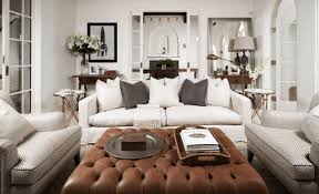 Amazing Design By Coco Republic White Sofa Brown Leather Tufted Ottoman Subtle But Graphic Chairs And Cozy Living Spaces Cozy Living Rooms Chic Living Room