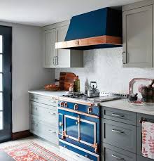 The color blue is commonly used in kitchens as an accent color, on a backsplash or painted on the island. 25 Blue And Grey Kitchen Designs That Inspire Digsdigs