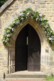 Bouquet tosses are less common at modern weddings, but if you are having a bouquet toss, it's nice to send the bouquet home with a glass vase so whoever catches it can enjoy it for another day or two. English Church Wedding Decoration Google Search Church Wedding Flowers Church Entrance Church Flowers