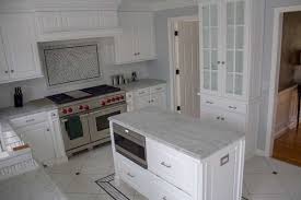 Imagine this white and grey quartz countertop throughout a gorgeous, contemporary kitchen. Honed White Carrara Marble Kitchen 01 Cincinnati Stoneworks