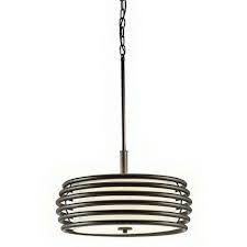 The clear seeded shades cast glow with a scattered effect and are reminiscent of glass panes beaded with droplets. Kichler Lighting 34759 Three Light Pendant Fixture In Olde Bronze Fini Quality Discount Lighting