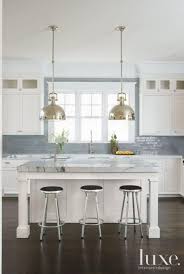 Contemporary Black Kitchen With Blue Quartzite Counters White Kitchen Design White Shaker Cabinets Kitchen