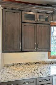 Dark cabinets don't have to be black—if the midnight mood isn't for you, consider a lighter shade of brown. Gray Stained Oak Cabinets How To Gray Wash Wood Full Size Of Stained Oak Cabinets Gra Stained Kitchen Cabinets Wooden Kitchen Cabinets Kitchen Cupboard Colours