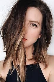 Asymmetrical hairstyle is one side is trimmed short the long blunt side swept bangs are curled to soften the look and brings emphasis to the big eyes. 50 Sexy Asymmetrical Bob Haircuts Lovehairstyles Com