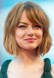 Give your hair a remarkable shine by choosing a dark shade for your thick strands. Emma Stone Short Bob Haircut With Bangs For Thick Hair Hairstyles Weekly
