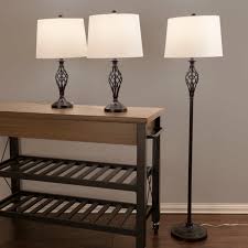 Whether flanked on either side of a couch or a bed, you can rest assured the added light of a table lamp set will brighten even the gloomiest of days. Elegant Designs Three Piece Black Lamp Set 2 Table Lamps 1 Floor Lamp Buy High Quality Three Piece Lamp Set Lamp Set For Living Room 3 Piece Lamp Set For Living Room Product