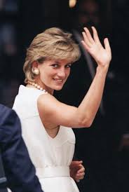 Lady diana has long red hair tied in a bun and supported with her wedding dress and a huge pink heart necklace. Princess Diana Hair Evolution Feathered Shags Sleek Pixie Cuts And More Vogue