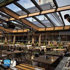 Benefits Of Retractable Skylight For A Commercial Space Rooftop Restaurant Design Rooftop Restaurant Restaurant Design