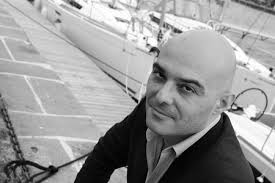 Image of Jack Kent Cooke in the Forum sports arena he built