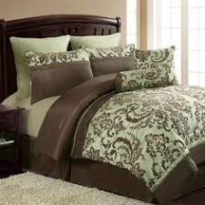 If you want your bedroom to be more adventurous, you can try your hand at mixing your comforter, quilts and coverlets in complementary color families like blue and orange, purple and yellow, red and green, etc. 7 Bedding Sets For A Sage Green Bed Room Ideas Bedding Sets Bed Comforter Sets