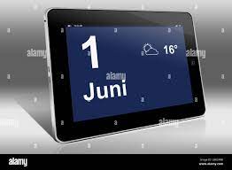 A tablet computer displays a calendar in German language with the date June  1st | Ein Tablet-Computer zeigt das Datum 1. Juni Stock Photo - Alamy