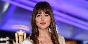 Dakota johnson is all smiles these days. Why Dakota Johnson S Smile Is Missing Her Usual Tooth Gap