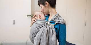 Munchkin jelly bean reversible sling. The Best Baby Wraps And Slings For 2018 Reviews By Wirecutter